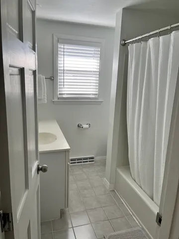 a bathroom with a toilet and a sink
