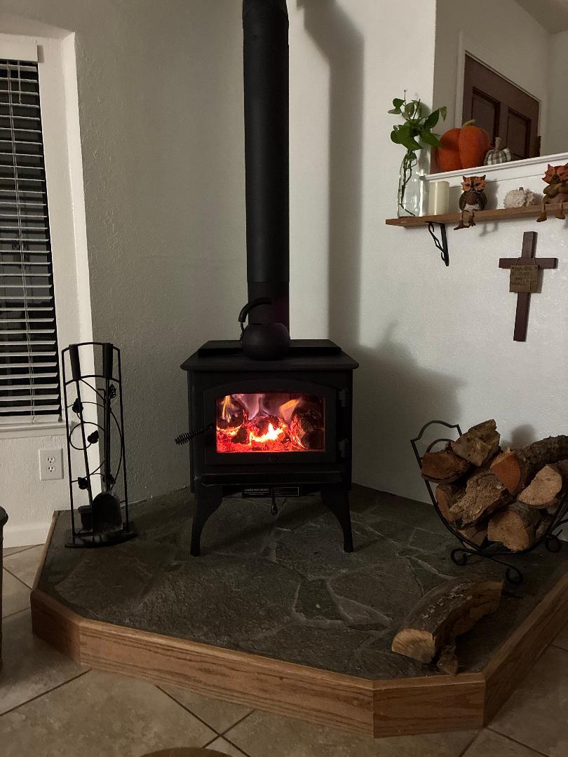 46725 Picayune Creek Road Coarsegold, CA 93614 - Photo 13 of 49 a room with furniture and a fireplace