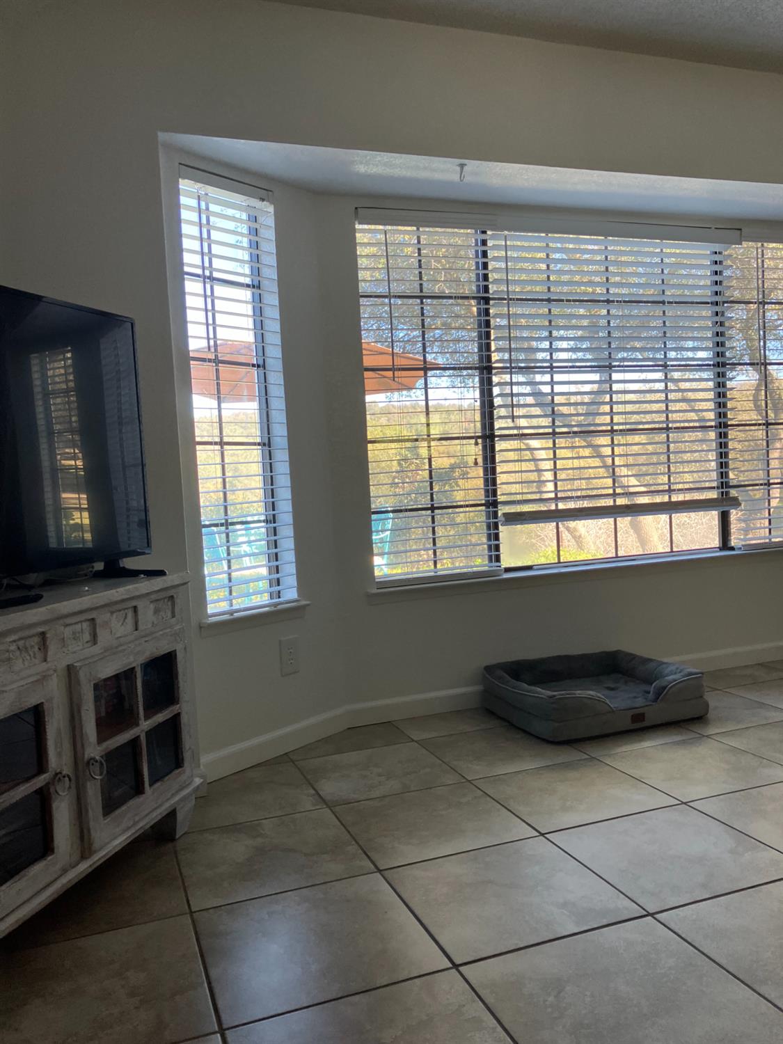 46725 Picayune Creek Road Coarsegold, CA 93614 - Photo 15 of 49 a kitchen with a stove a sink and a window