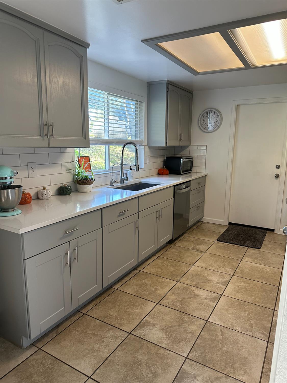 46725 Picayune Creek Road Coarsegold, CA 93614 - Photo 17 of 49 a kitchen with a sink cabinets and window