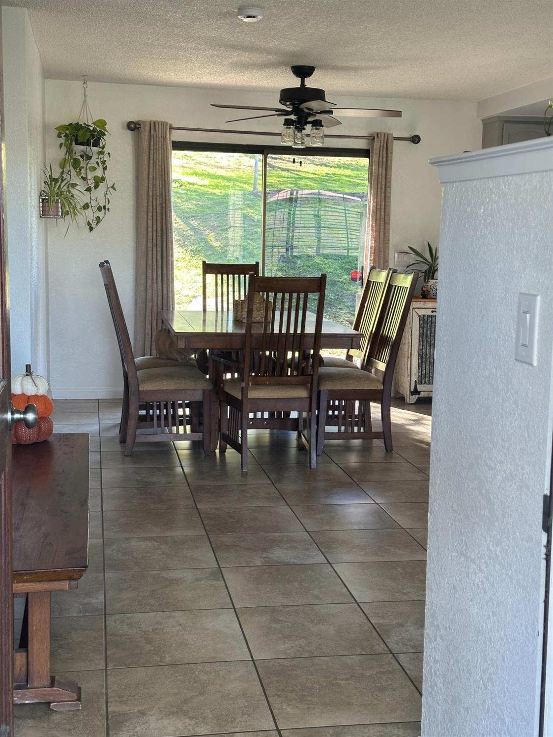 46725 Picayune Creek Road Coarsegold, CA 93614 - Photo 7 of 49 a dining room with furniture and window