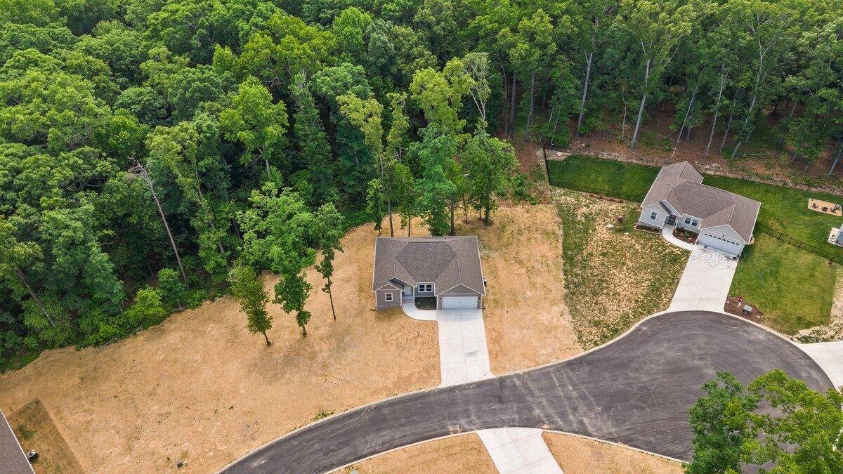 129 County Road 155 Riceville, TN 37370 - Photo 25 of 31 an aerial view of a house with a yard and lake view