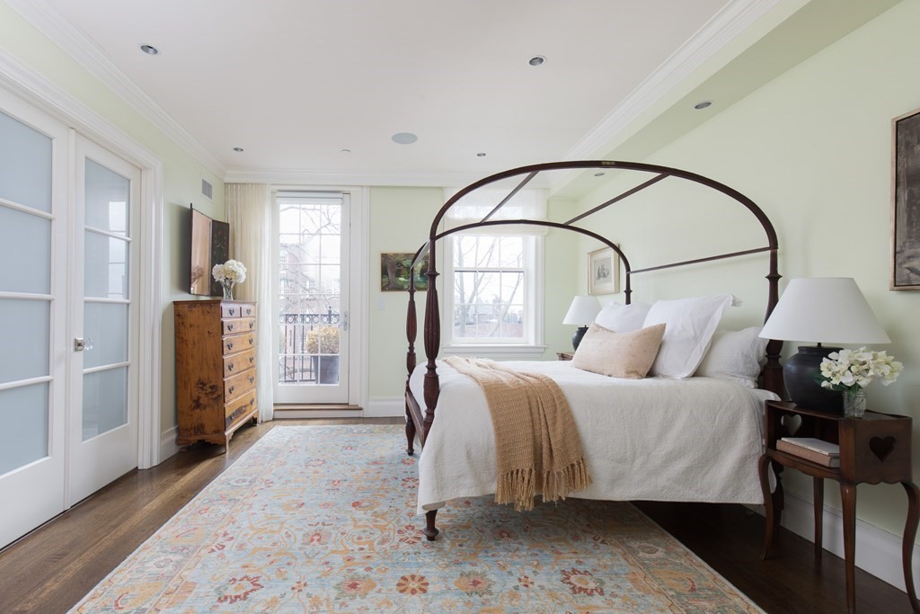 28 Mt Vernon Street, Unit 2 Boston, MA 02108 - Photo 11 of 31 a bedroom with a bed and a mirror