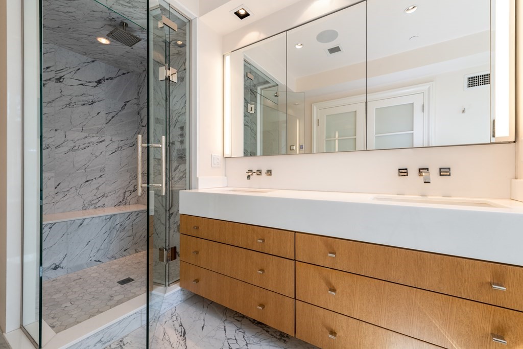 28 Mt Vernon Street, Unit 2 Boston, MA 02108 - Photo 15 of 31 a bathroom with a sink and a mirror