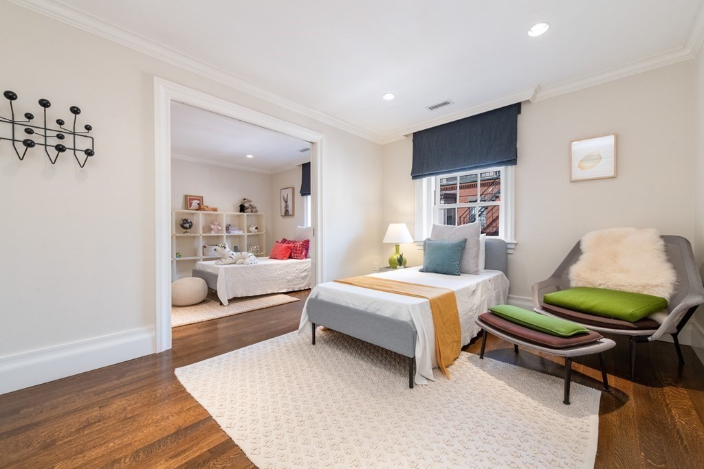 28 Mt Vernon Street, Unit 2 Boston, MA 02108 - Photo 23 of 31 a bedroom with a bed and a couch