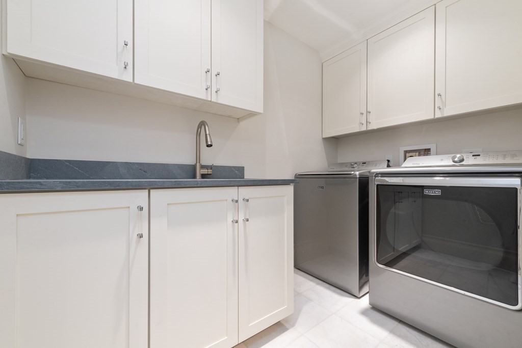 28 Mt Vernon Street, Unit 2 Boston, MA 02108 - Photo 25 of 31 a kitchen with granite countertop cabinets stainless steel appliances and a sink