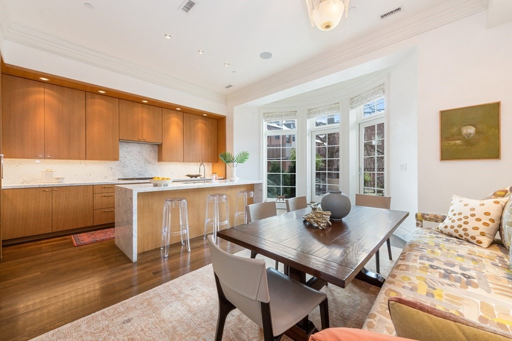 28 Mt Vernon Street, Unit 2 Boston, MA 02108 - Photo 3 of 31 a view of a dining room with furniture and wooden floor