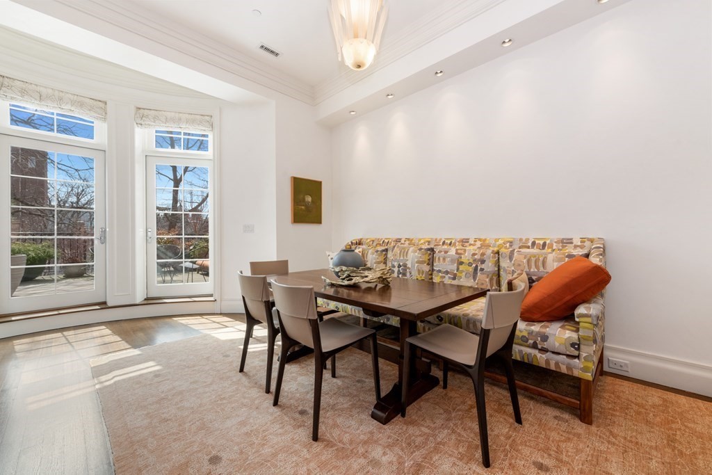 28 Mt Vernon Street, Unit 2 Boston, MA 02108 - Photo 4 of 31 a view of a dining room with furniture and a window