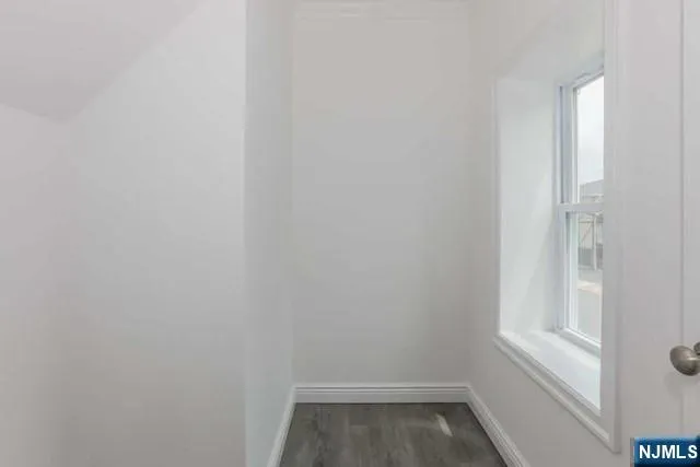 a view of small space with racks on the wall