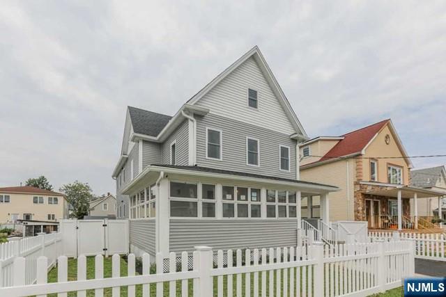 24 Henry Place, Unit 2 Hackensack, NJ 07601 - Photo 2 of 26 a view of a large white building