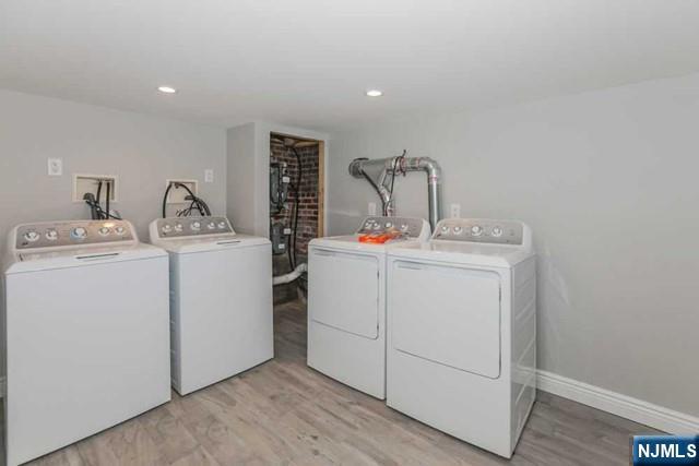 24 Henry Place, Unit 2 Hackensack, NJ 07601 - Photo 25 of 26 a utility room with dryer and washer