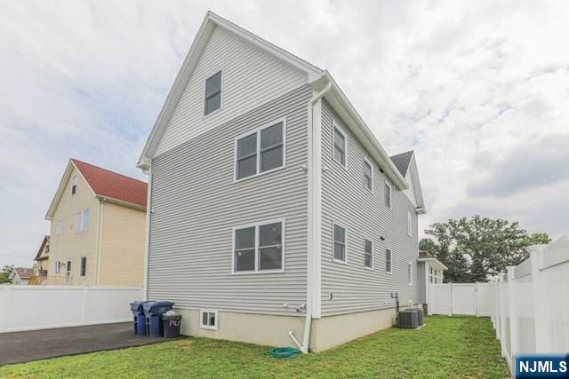24 Henry Place, Unit 2 Hackensack, NJ 07601 - Photo 4 of 26 a front view of house with yard