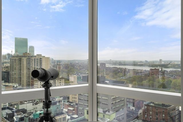 a view of a lake from a balcony