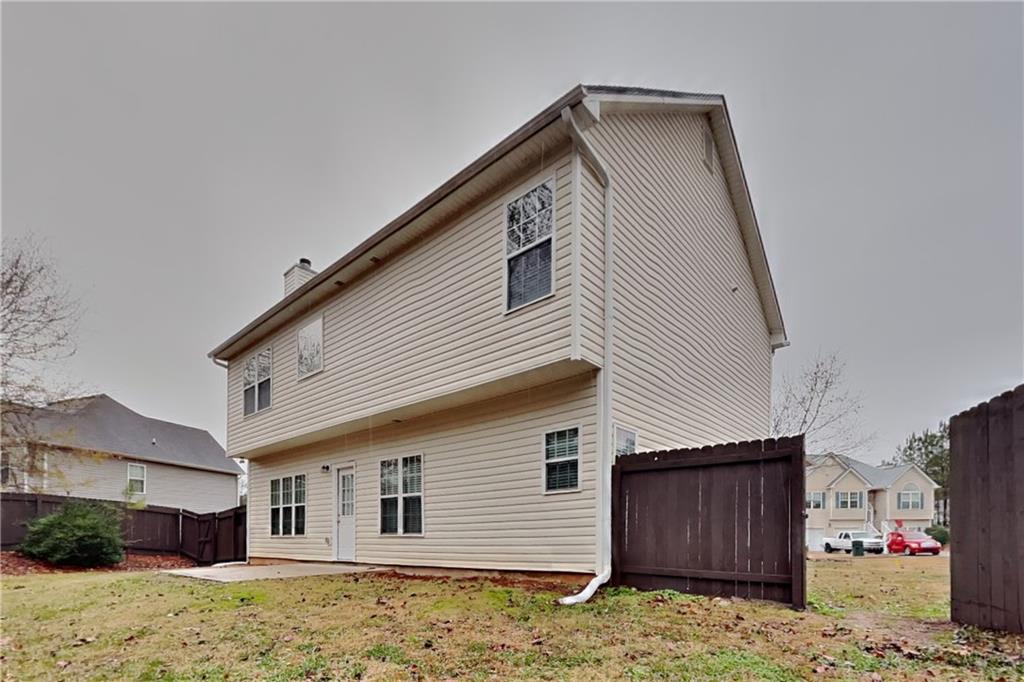 15 Jessica Lane Dallas, GA 30157 - Photo 20 of 23 a front view of a house with a yard