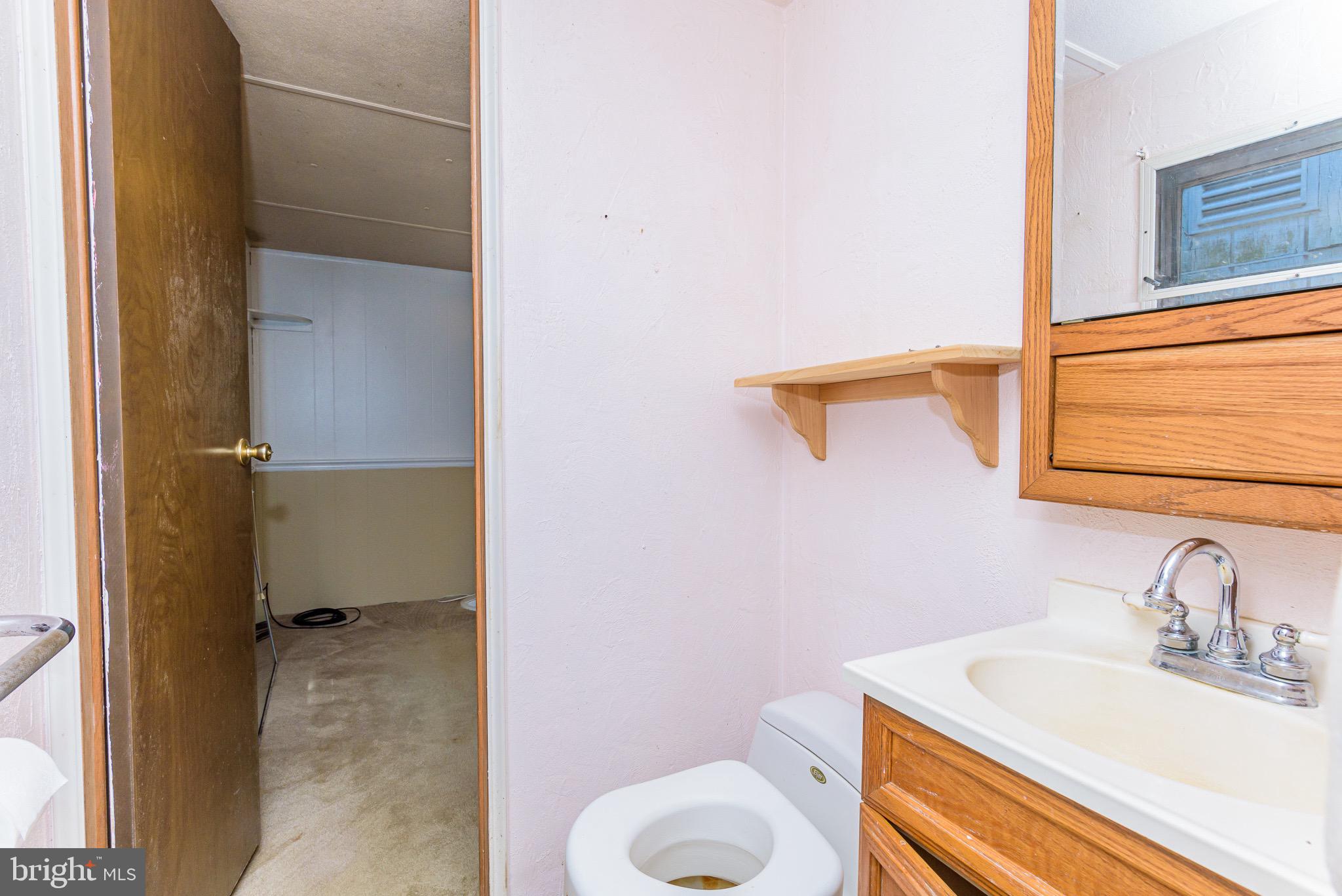 9753 Timmonstown Road Berlin, MD 21811 - Photo 26 of 42 Half Bath