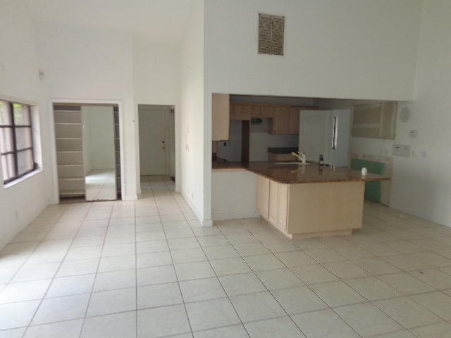 9345 Old Pine Road Boca Raton, FL 33428 - Photo 6 of 38 Kitchen and family room