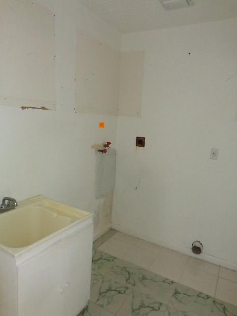 9345 Old Pine Road Boca Raton, FL 33428 - Photo 9 of 38 Laundry room