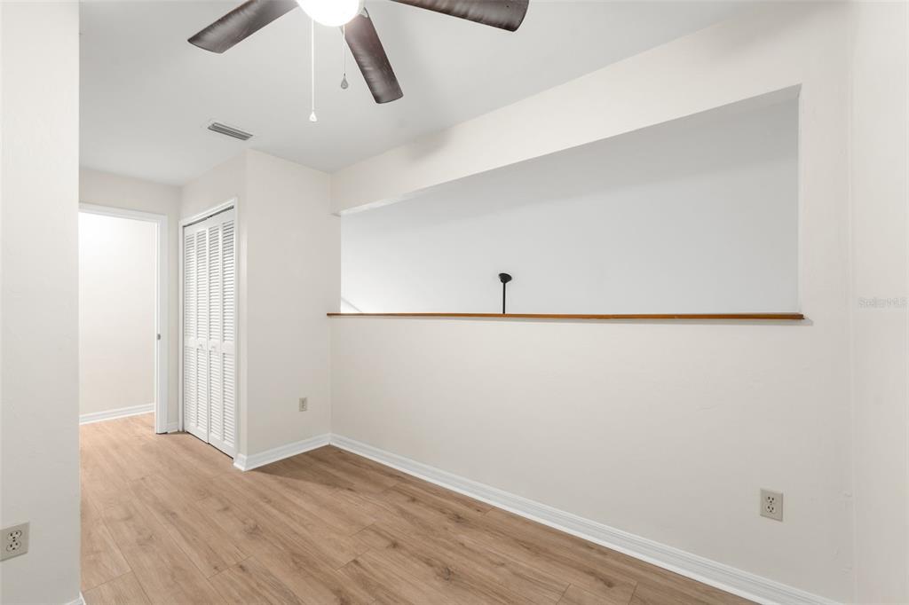 912 Southwest 57th Drive Gainesville, FL 32607 - Photo 20 of 34 a view of a small space with wooden floor