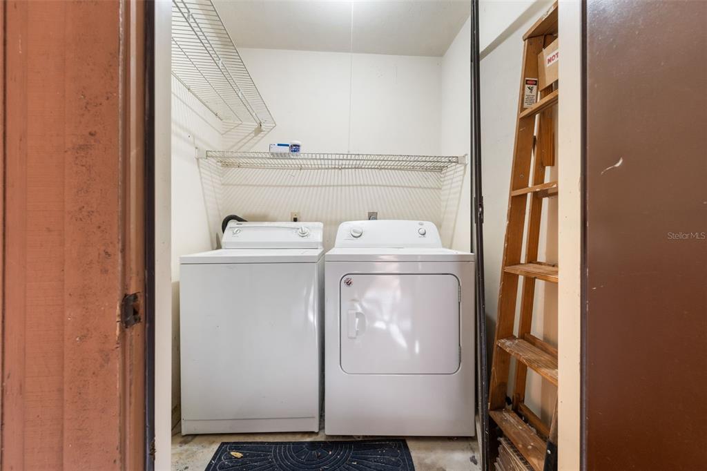 912 Southwest 57th Drive Gainesville, FL 32607 - Photo 23 of 34 a utility room with dryer and washer
