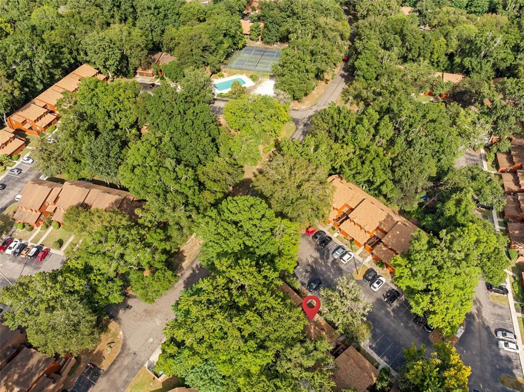 912 Southwest 57th Drive Gainesville, FL 32607 - Photo 31 of 34 an aerial view of a house with a yard and garden