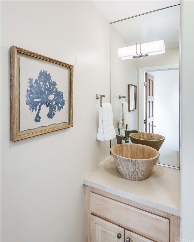 2220 The Strand Manhattan Beach, CA 90266 - Photo 17 of 44 a bathroom with a sink and a mirror