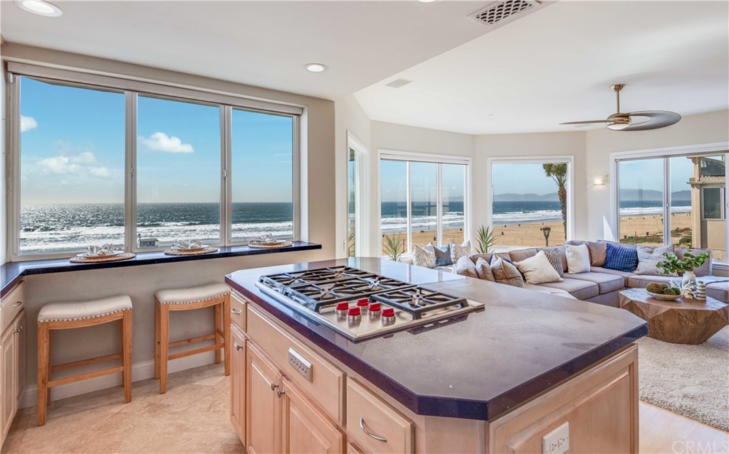 2220 The Strand Manhattan Beach, CA 90266 - Photo 21 of 44 a living room with furniture and a table
