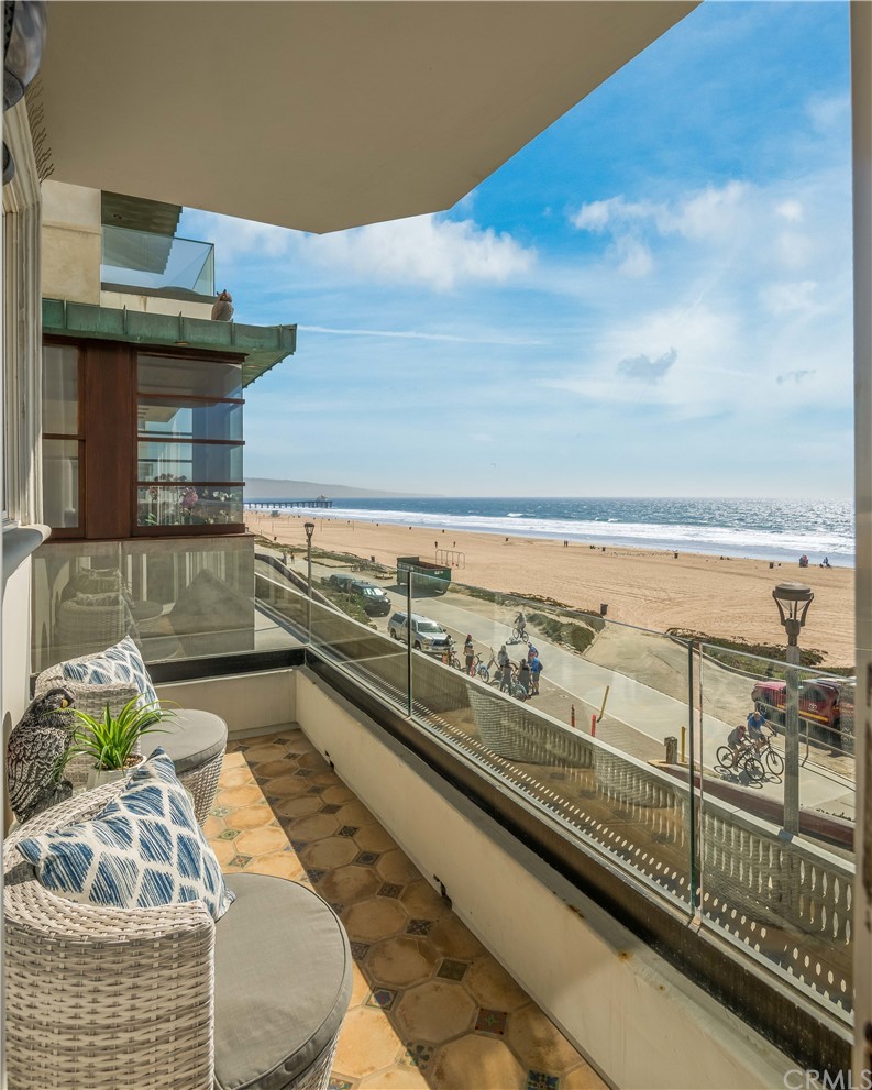 2220 The Strand Manhattan Beach, CA 90266 - Photo 23 of 44 a view of a balcony with chair and the ocean view