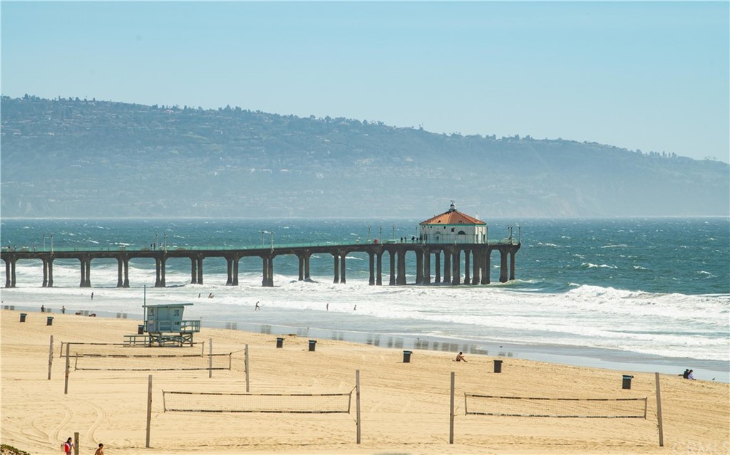 2220 The Strand Manhattan Beach, CA 90266 - Photo 24 of 44 a view of a swimming pool with an ocean view