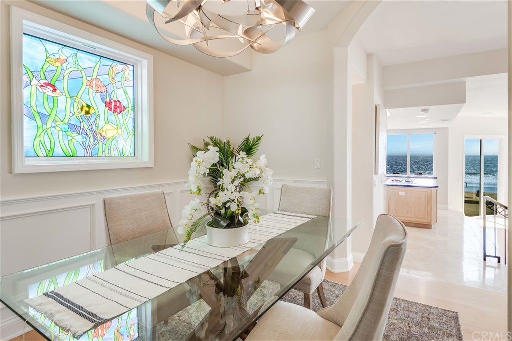 2220 The Strand Manhattan Beach, CA 90266 - Photo 28 of 44 a dining room with furniture and wooden floor