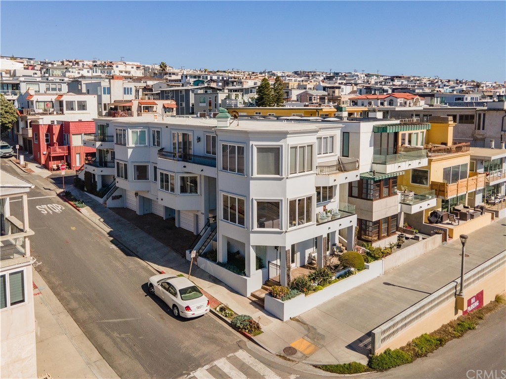 2220 The Strand Manhattan Beach, CA 90266 - Photo 42 of 44 a front view of a building with street view