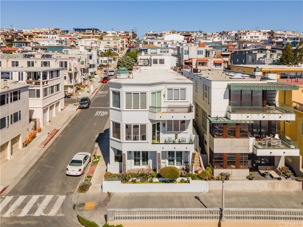 2220 The Strand Manhattan Beach, CA 90266 - Photo 43 of 44 a front view of a multi story building