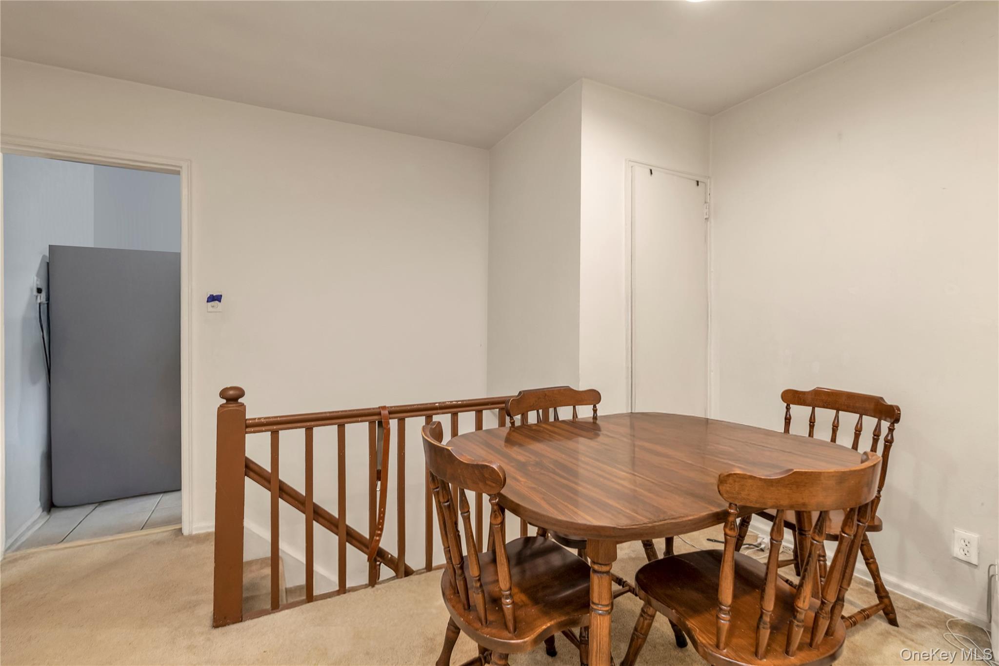 73-47 217th Street, Unit 364A2 Queens, NY 11364 - Photo 5 of 12 a view of a dining room with furniture and wooden floor