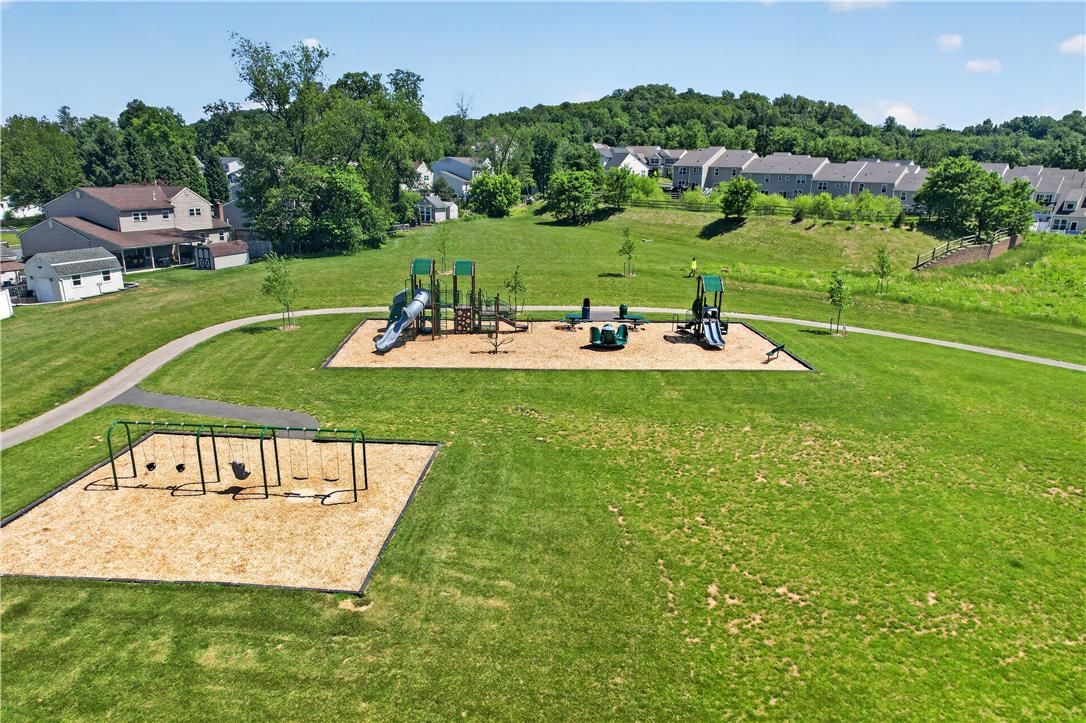 4502 Benjamin Court Emmaus, PA 18049 - Photo 48 of 48 A community playground awaits with multiple structures, inviting outdoor recreation and neighborhood enjoyment.