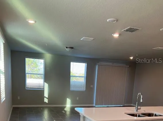 a view of a room with windows