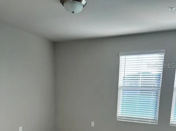 a view of a livingroom with a window