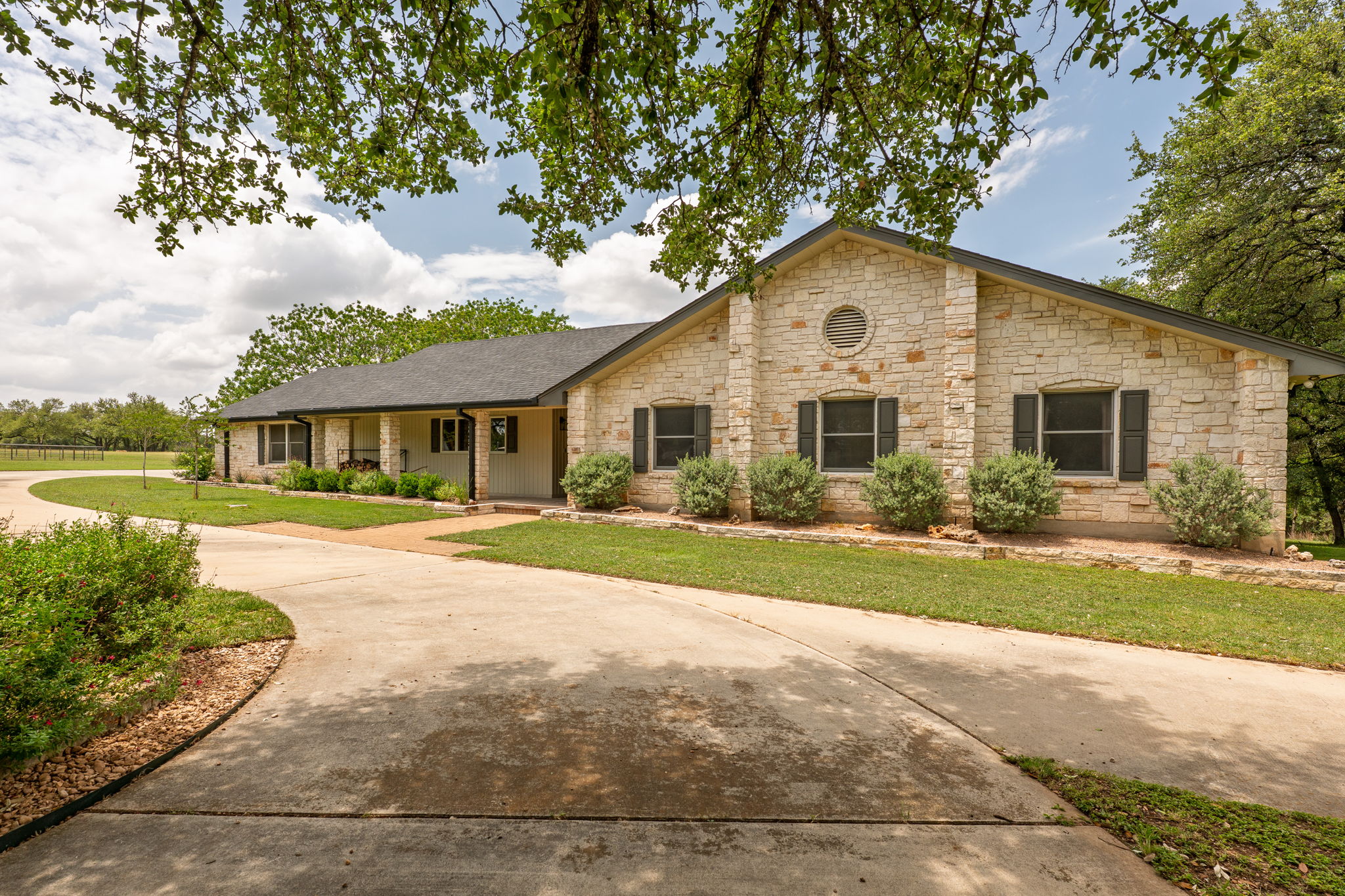 320 Greenridge Road Georgetown, TX 78628 - Photo 2 of 38 a front view of a house with a yard and garage