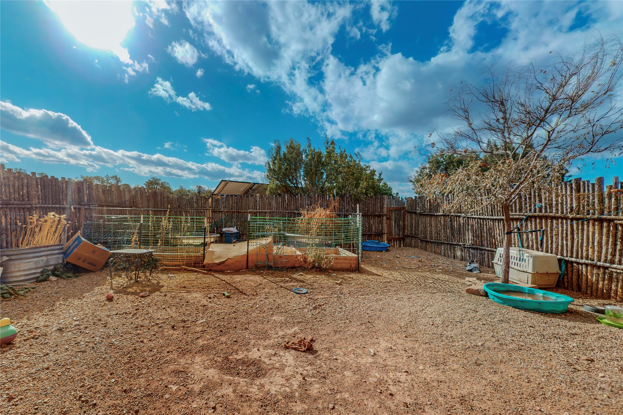 29 County Road B41E Ribera, NM 87560 - Photo 40 of 51 Raised garden beds in side garden