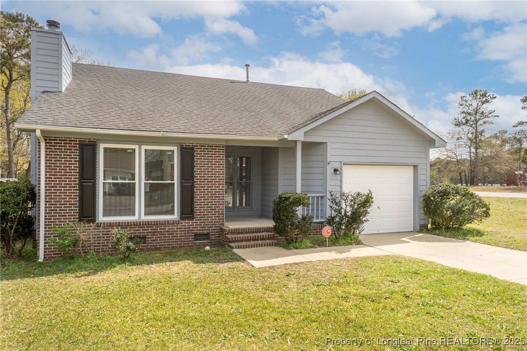 6576 Applewhite Road Fayetteville, NC 28304 - Photo 1 of 35 a front view of a house having yard