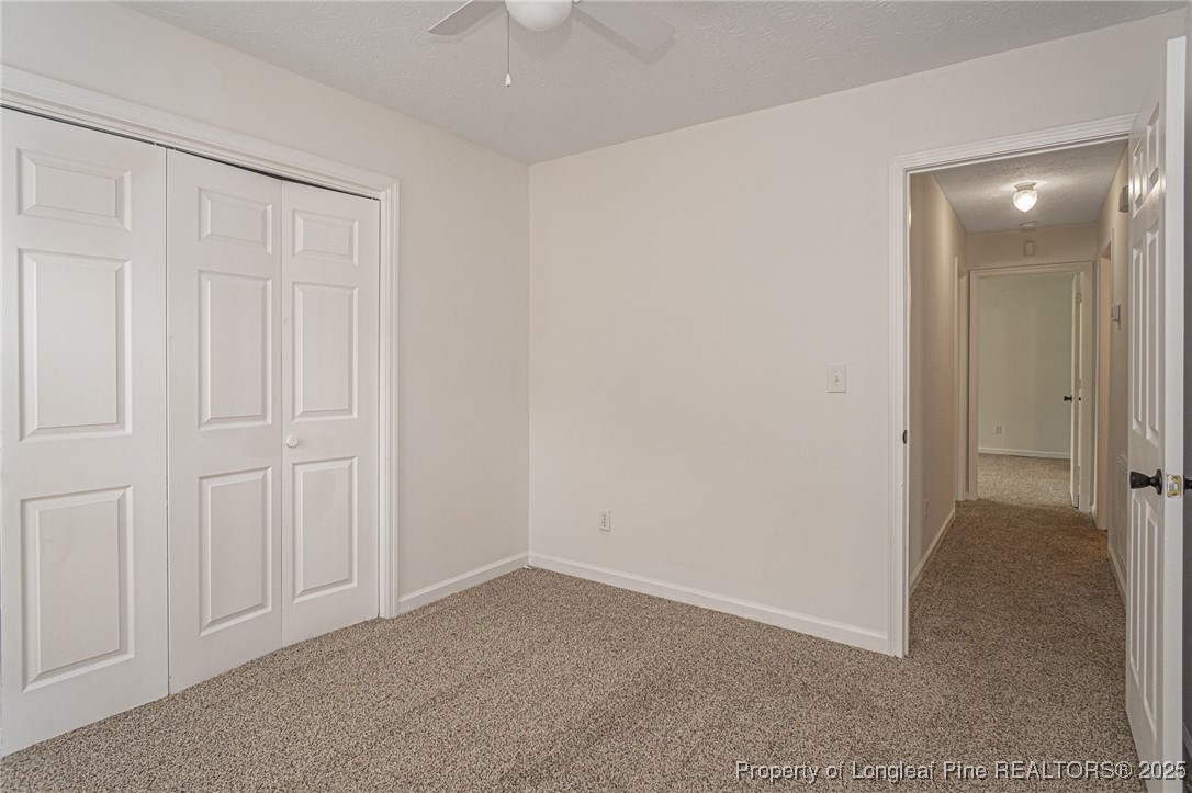 6576 Applewhite Road Fayetteville, NC 28304 - Photo 13 of 35 an empty room with closet area