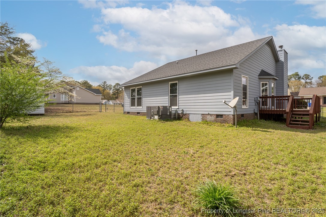 6576 Applewhite Road Fayetteville, NC 28304 - Photo 2 of 35 a view of a house with a yard and sitting area