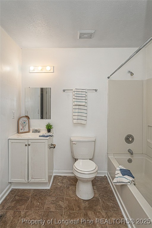 6576 Applewhite Road Fayetteville, NC 28304 - Photo 21 of 35 a spacious bathroom with a toilet a sink and mirror