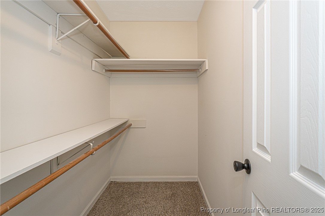 6576 Applewhite Road Fayetteville, NC 28304 - Photo 24 of 35 a view of a room with rack on the wall