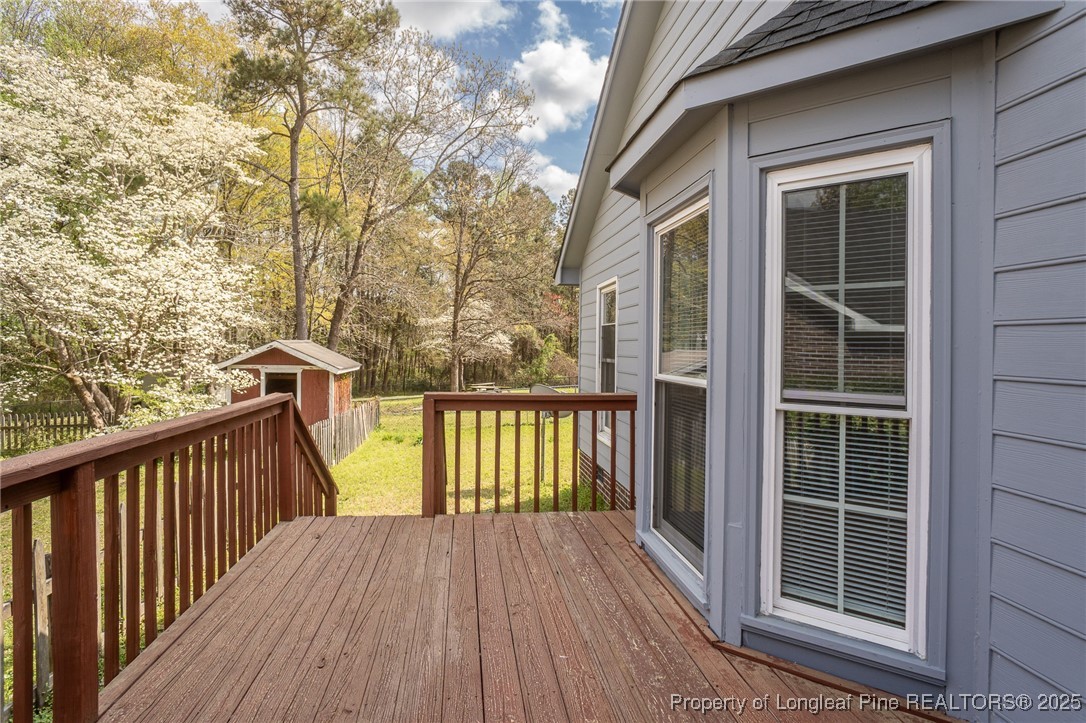 6576 Applewhite Road Fayetteville, NC 28304 - Photo 29 of 35 a view of balcony with wooden floor