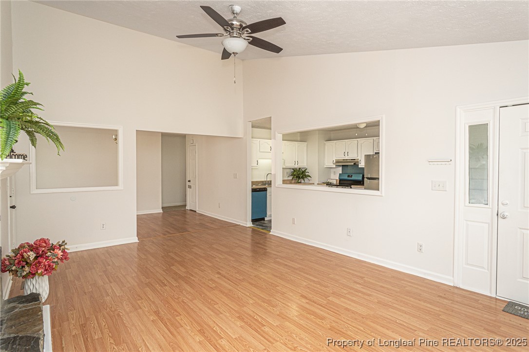 6576 Applewhite Road Fayetteville, NC 28304 - Photo 5 of 35 a view of a kitchen with a sink and a refrigerator