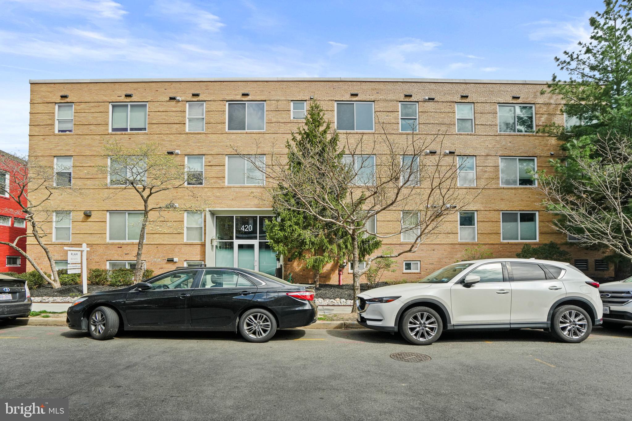 420 16th Street Southeast, Unit 103 Washington, DC 20003 - Photo 1 of 16 a car parked in front of a building