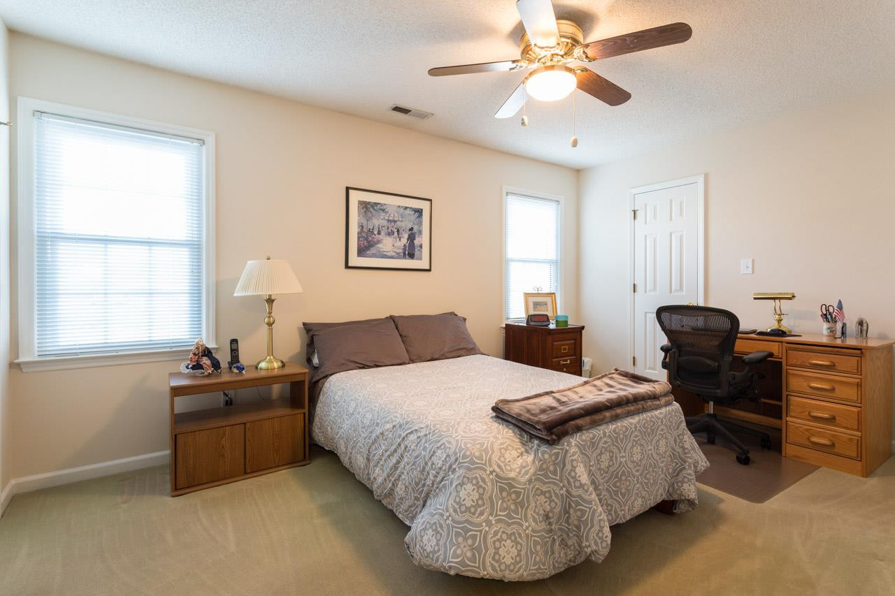 6705 Twin Tree Court Raleigh, NC 27613 - Photo 14 of 20 Second floor bedroom with two closets and private bath. Bedroom