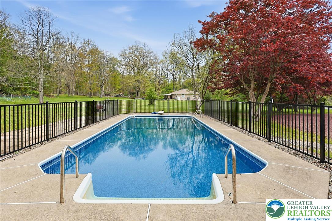 121 Ben Titus Road Tamaqua, PA 18252 - Photo 5 of 48 a view of swimming pool with a backyard