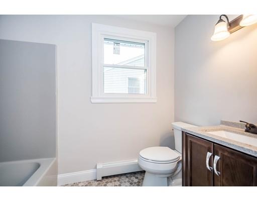 5 Emerson Road Billerica, MA 01821 - Photo 17 of 25 a bathroom with a toilet a sink and mirror