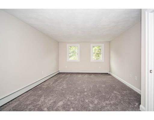 5 Emerson Road Billerica, MA 01821 - Photo 18 of 25 a view of an empty room with windows