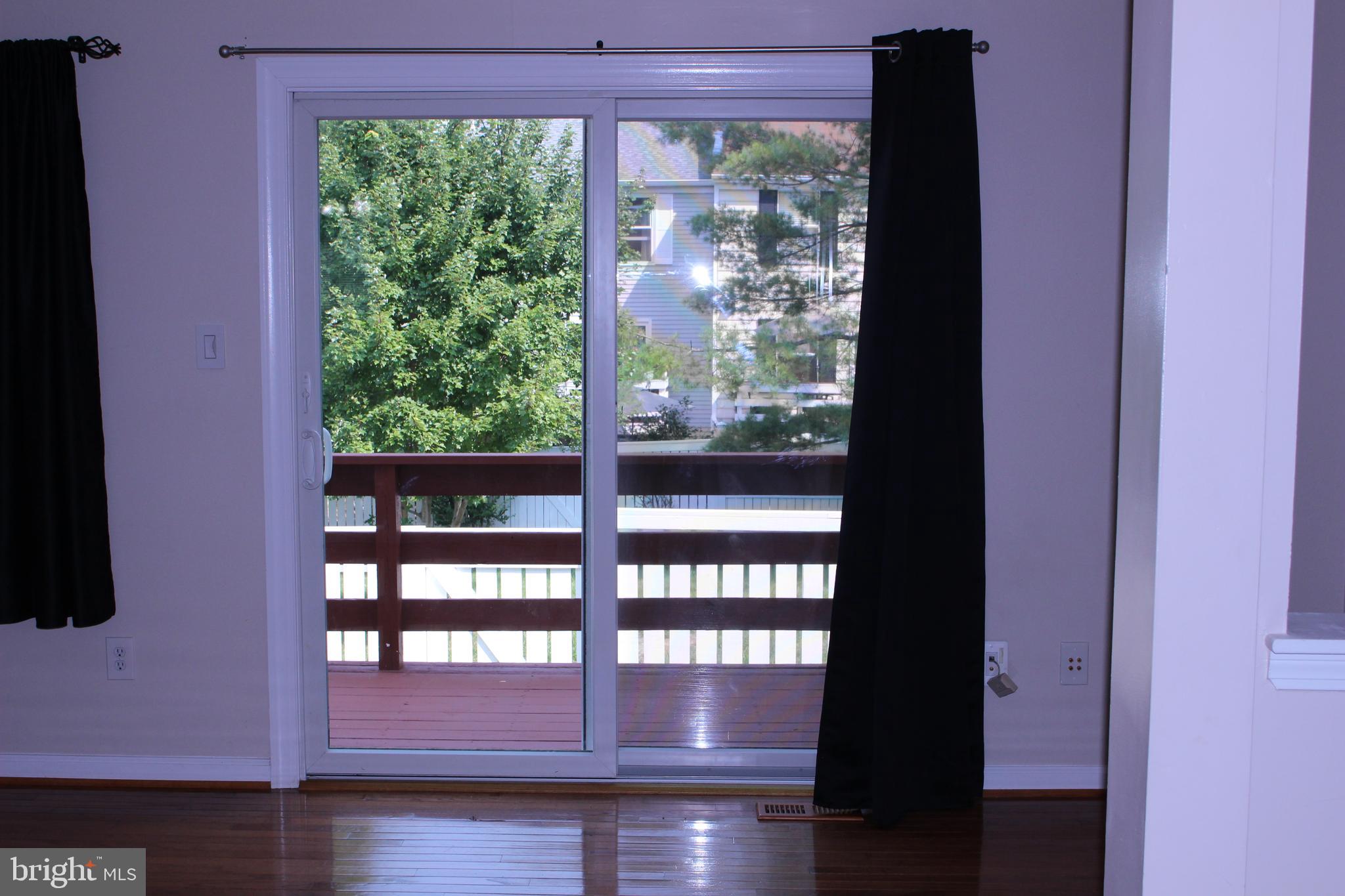 1743 Sundance Drive Reston, VA 20194 - Photo 10 of 29 LR 4 Sliding Glass Door to Deck